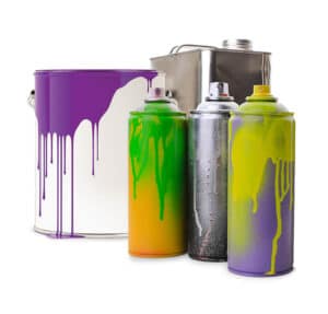 Used spray paint and paint cans.